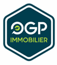 Logo hexagonal bleu et vert OGP IMMOBILIER avec symbole en forme de coche.
